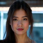 Professional headshot of Sarah Chen, Elite Personal Trainer